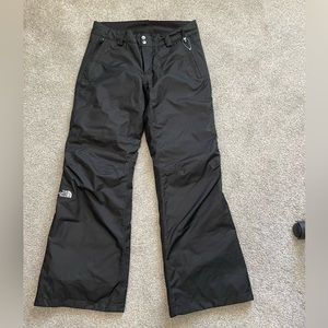Black insulated ski pants